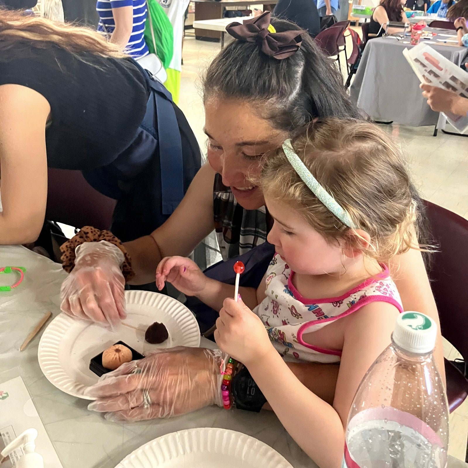Parent and child making wagashi
