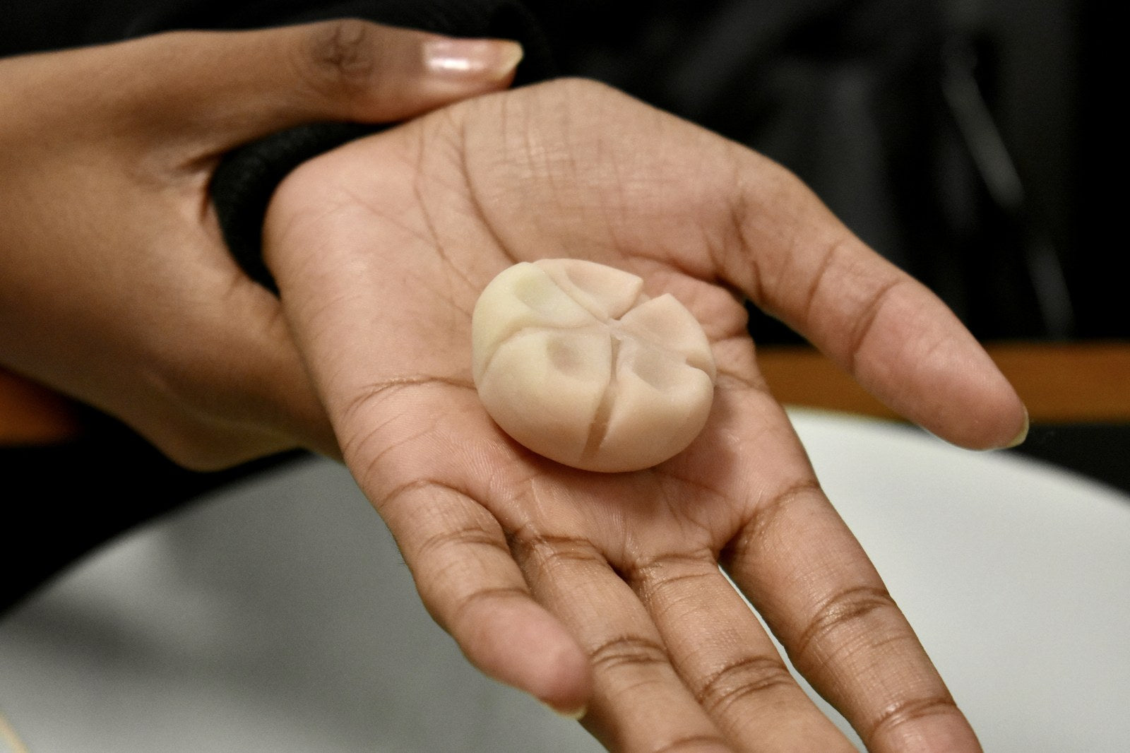 Woman experiencing calm wagashi ritual